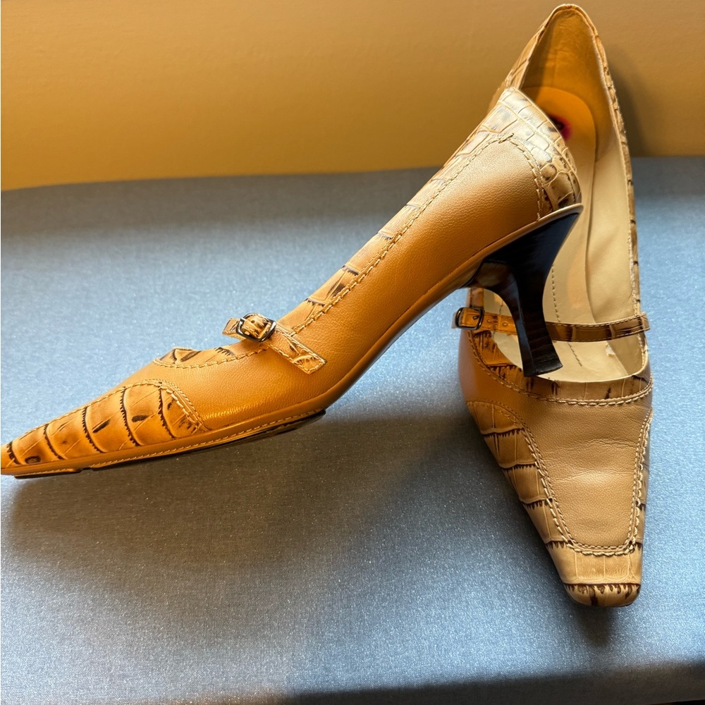 Tan kitten heel shoe with strap across the top
